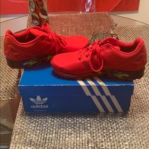 Adidas gym shoes, in excellent shape. Boys- size 7